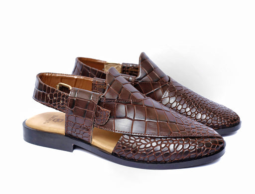 Step into timeless elegance with brayt Peshawari Chappals, Kaptaan Chappals, and Kheri Chappals for men. Explore our collection of handcrafted Peshawari sandals and Kohati Chappals, designed to exude style and comfort. Discover the finest selection of gents' Norozi Chappals that embody the rich cultural heritage of Pakistan. Shop now and embrace the essence of traditional footwear craftsmanship.