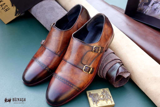 Leather sole, Double Monk, Monk Shoes, Calf leather shoes, Double Monk Strap shoes, Brown colour leather shoes, patina shoes Pakistan,shoe size chart, shoe sizes for men, now available in Pakistan. Genuine leather sole, handmade shoes, shoes for men in Pakistan, handmade shoes in Pakistan, shoes for wedding, Buzkashi, imported leather, leather shoes for men, leather shoes in Pakistan, leather shoes price, leather gifts, leather shoes for office, stylish men shoes, Pakistan No. 1, best selling shoes of 2021