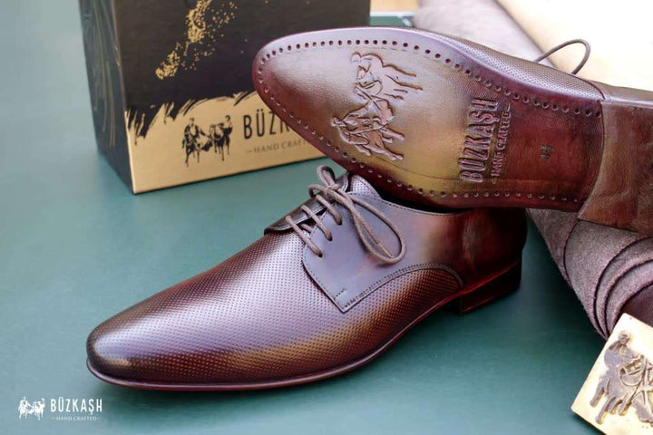 Wholecut Derby shoes, handstitched, Calf leather shoes, Double Monk Strap shoes, Brown colour leather shoes, patina shoes Pakistan,shoe size chart, shoe sizes for men, now available in Pakistan. Genuine leather, handmade shoes, shoes for men in Pakistan, handmade shoes in Pakistan, shoes for wedding, Buzkashi, imported leather, leather shoes for men, leather shoes in Pakistan, leather shoes price, leather gifts, leather shoes for office, stylish men shoes, Pakistan No. 1, best selling shoes of 2021