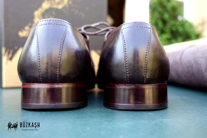 Wholecut Derby shoes, handstitched, Calf leather shoes, Double Monk Strap shoes, Brown colour leather shoes, patina shoes Pakistan,shoe size chart, shoe sizes for men, now available in Pakistan. Genuine leather, handmade shoes, shoes for men in Pakistan, handmade shoes in Pakistan, shoes for wedding, Buzkashi, imported leather, leather shoes for men, leather shoes in Pakistan, leather shoes price, leather gifts, leather shoes for office, stylish men shoes, Pakistan No. 1, best selling shoes of 2021