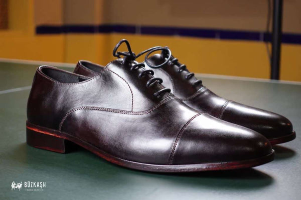 Cap-toe Oxford shoes, hand-stitched, Calf leather shoes, Double Monk Strap shoes, Brown colour leather shoes, patina shoes Pakistan,shoe size chart, shoe sizes for men, now available in Pakistan. Genuine leather, handmade shoes, shoes for men in Pakistan, handmade shoes in Pakistan, shoes for wedding, Buzkashi, imported leather, leather shoes for men, leather shoes in Pakistan, leather shoes price, leather gifts, leather shoes for office, stylish men shoes, Pakistan No. 1, best selling shoes of 2021