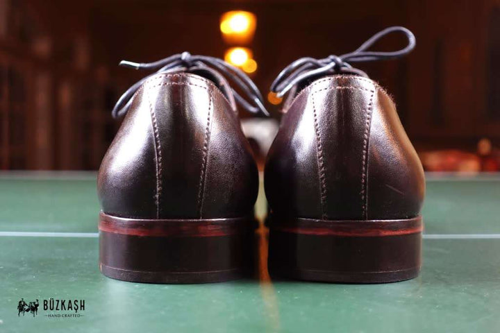 Cap-toe Oxford shoes, hand-stitched, Calf leather shoes, Double Monk Strap shoes, Brown colour leather shoes, patina shoes Pakistan,shoe size chart, shoe sizes for men, now available in Pakistan. Genuine leather, handmade shoes, shoes for men in Pakistan, handmade shoes in Pakistan, shoes for wedding, Buzkashi, imported leather, leather shoes for men, leather shoes in Pakistan, leather shoes price, leather gifts, leather shoes for office, stylish men shoes, Pakistan No. 1, best selling shoes of 2021